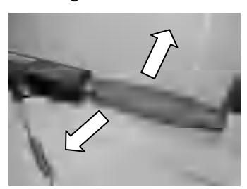Moving tiller handle left or right to change direction