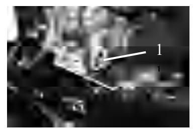 Oil dipstick showing oil level check