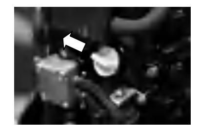 Oil draining from engine with filler cap removed